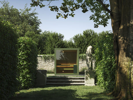 Thermowood outdoor sauna in a Surrey garden, available to view at Cedar Nursery in Cobham
