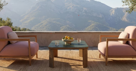 Barlow Tyrie teak garden furniture displayed outdoors, showing natural wood grain and craftsmanship