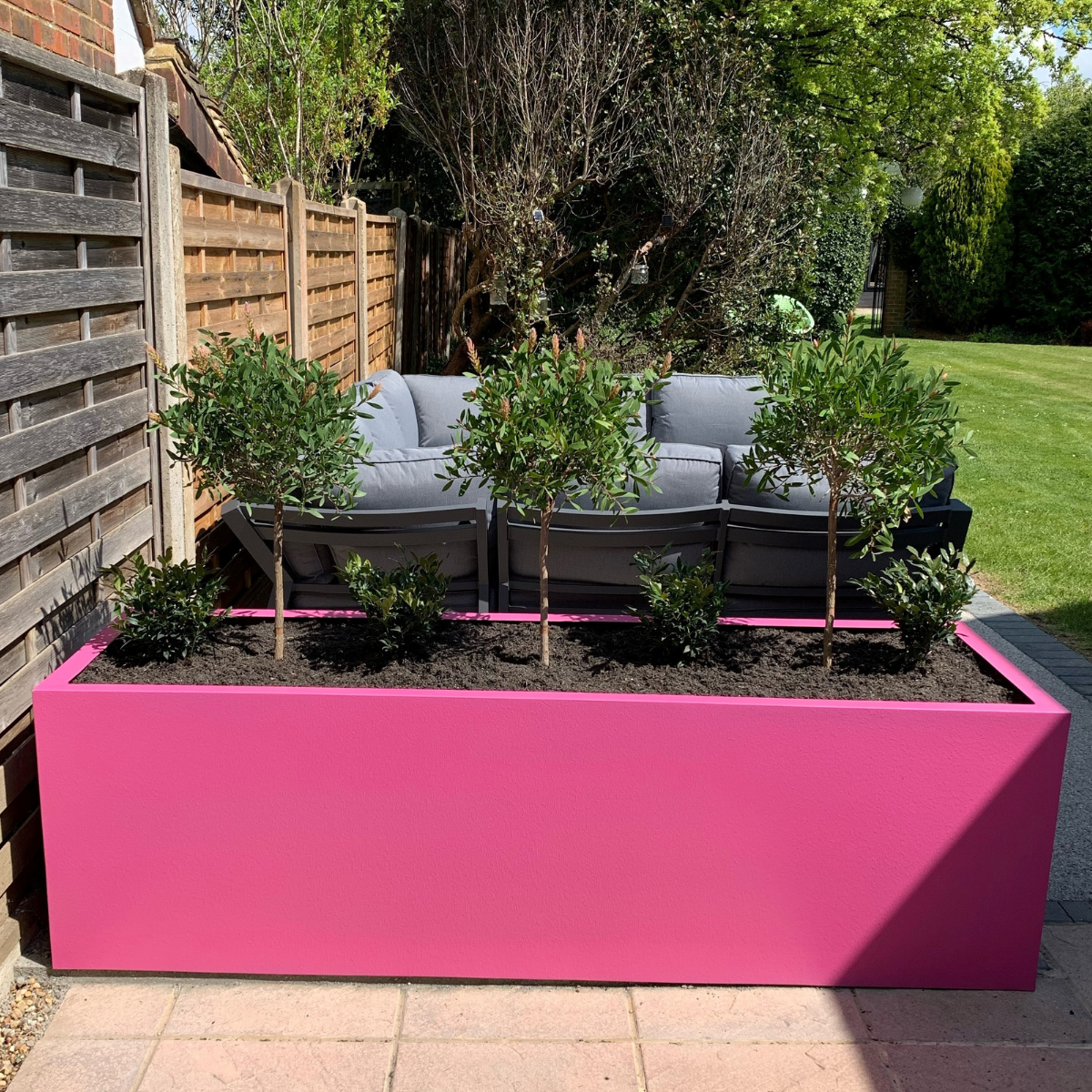 Pink garden planters in Surrey